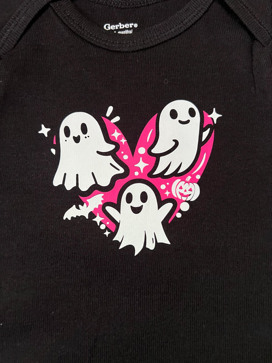 Black baby bodysuit with a pink heart design featuring cute white ghosts